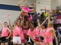 LIFT IT UP. The powder puff cheer team put on their entertaining show at Wednesdays September 26 Peprally. The crowd went wild over the boys.