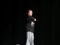 Community member Amy Kells starts off in a pose for her dance routine to "Everybody (Backstreet's Back)" by the Backstreet Boys.