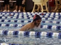 Junior Igor Sheshukov competes in the breast stroke at the Topeka Intitational.