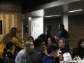 Students laugh together as they enjoy their food at the StuCo club feast. Senior Macy Hendricks reaches for more snacks as she talks to other club members.
Photo by Kyla Barnett