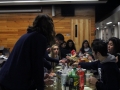 Councilor Erin Spreer helps students find out how to cook a container of shrimp that was brought to the StuCo club feast, which they later realized was supposed to be cooked beforehand.
Photo by Kyla Barnett