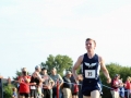 SPRINTING SENIOR Senior Aaron Hoff takes 15th place, leading as Manhattan's seventh runner. Hoff ran a 4K with a time of 19:48.9 at the Warner Park meet on September 7. The Boys Junior Varsity team placed first with a score of 19, Garder-Edgerton second with 68. Photo by Julianna Poe