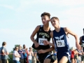 FIERCE FIGHTER Freshman Zachery Goscha fights for a time win against a Topeka runner. Goscha placed 22nd with a time of 20:10.2, -- just one tenth of a second away from 21st -- having ran a 4K at the Warner Park meet on September 7. The Boys Junior Varsity team placed first with a score of 19, Garder-Edgerton second with 68. Photo by Julianna Poe