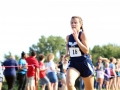 SENIOR STEWART Senior Emily Stewart barrels toward the finish line as the third leading Manhattan runner. Stewart placed third with a time of 18:12.5, having ran a 4K at the Warner Park meet on September 7. The Girls Junior Varisty team placed first overall with a score of 21, Emporia second with a 35. Photo by Julianna Poe