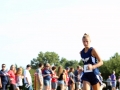 AWESOME ARASMITH Sophomore Kyra Arasmith speeds toward the finish line, leading as Manhattan's 12th runner. Arasmith finished with a time of 21:42.4, having ran a 4K at the Warner Park meet on September 7. Photo by Julianna Poe