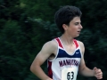 MEMORABLE MOSIER Sophomore Ben Mosier zips past as the fourth Manhattan lead runner. Mosier placed eighth with a time of 17:40.1, having ran a 5K at the Warner Park meet on September 7. Overall, the Boys Varsity team placed first with a score of 37, Gardner-Edgerton second with 56. Photo by Julianna Poe