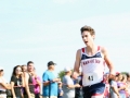 WINNER WICHMANN Senior Luke Wichmann speeds past the finish line as Manhattan's seventh lead runner. Wichmann placed 24th with a time of 18:28.1, having ran a 5K at the Warner Park meet on September 7. Overall, the Boys Varsity team placed first with a score of 37, Gardner-Edgerton second with 56. Photo by Julianna Poe