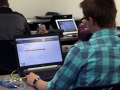 Two Timing. Junior Aaron Hoff works on his computer, looking at stocks in his Buisness and Personal Finance class. As this class ends he heads to Meadowlark where he works as the manager. Photo by Kami Bussmann