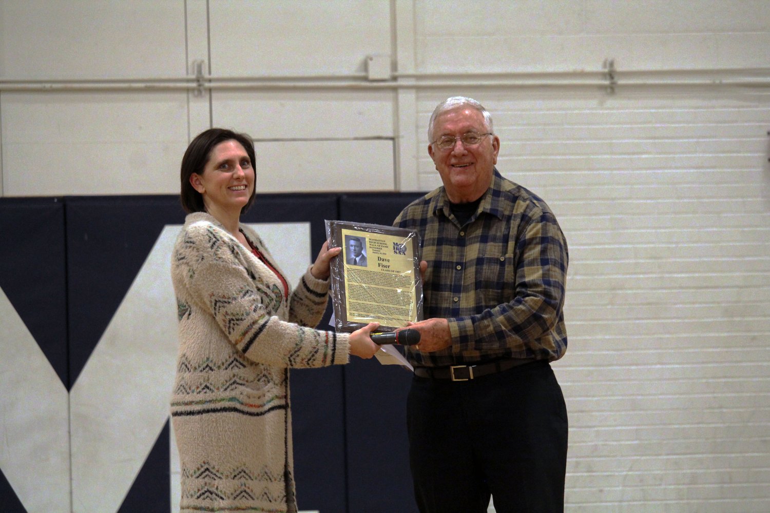 Dave Fiser recieves an alumni award at the halftime of the MHS vs Seaman basketball game.