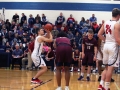 Peyton Weixelman takes his free shots after being fouled by a Seaman High player.