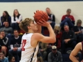 #12 on the MHS Basketball team takes a free throw after being fouled.