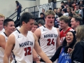 Sweet Success. The MHS Basketball team laughs with friends from the crowd.
