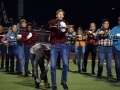 Junior ? performs with the MHS Big Blue Marching Band during their halftime show. The performance featured country music and band students dressed in classic blue jeans and flannels to sell the show. Photo by Hailey Eilert