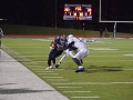 Senior BJ Young drives down the field as his opponets attempt to end the play. Young and the MHS team battled for another team win on Oct. 11 against Junction CIty. The close game came to an end when the Indians scored in the last moments of the game, securing the bag for MHS and the return of the silver trophy. Photo by Hailey Eilert