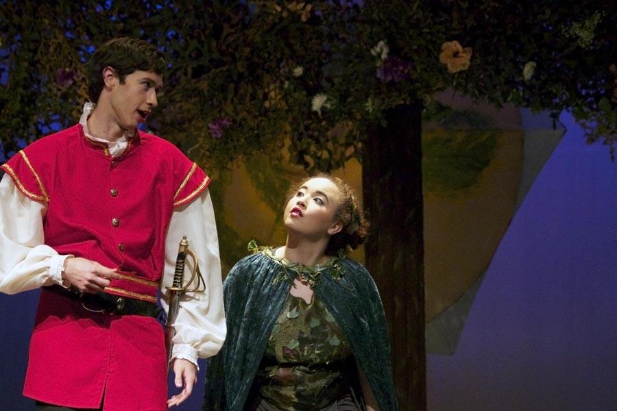 Junior Savannah Smith, as Robin Goodfellow, curiously observes senior Daniel Aramouni, as Lysander, during a dress rehearsal of A Midsummer Nights Dream.