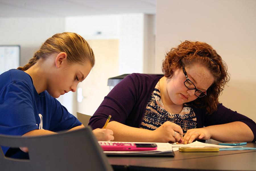 Students solve functions for feasts