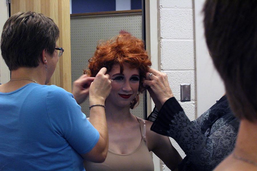 Senior Emma Galitzer is fitted for her wig for her character, Adelaid. Galitzer has one of the main roles in "Guys and Dolls" but said she has been handling it well.
