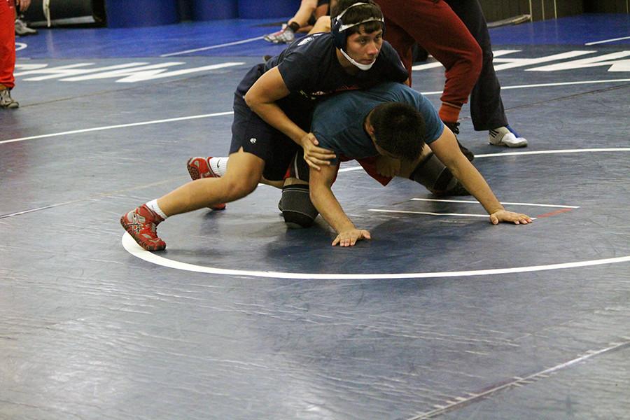 Wrestling drops first two meets of season
