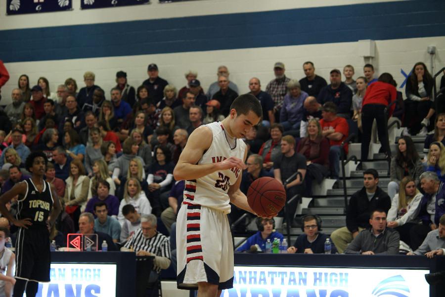 Senior Gabe Awbrey goes through his free throw routine Friday night against Topeka High. Awbrey finished with a game-high 17 points.