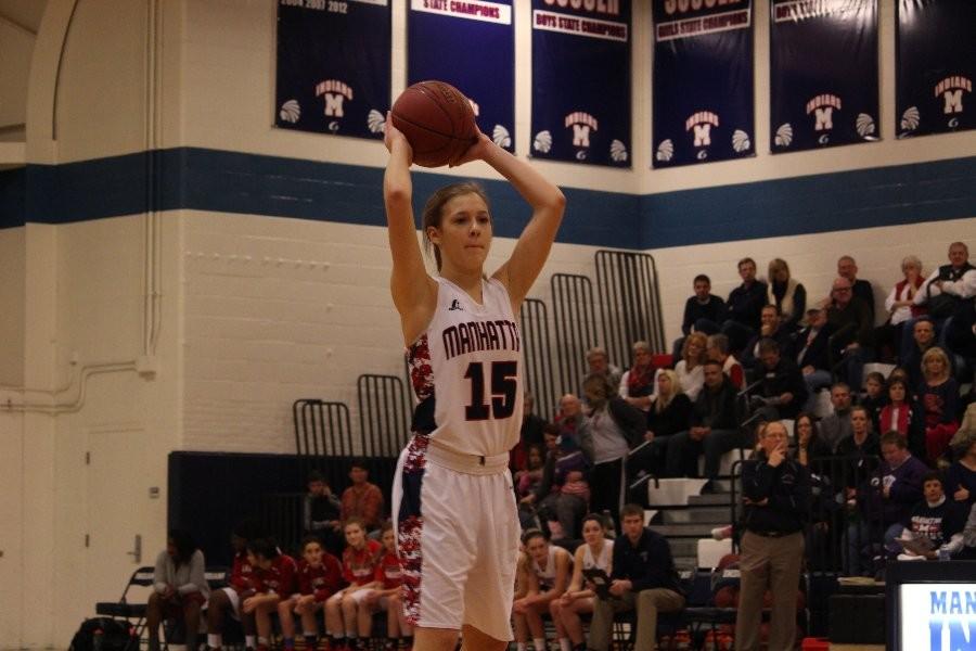 Freshman Garrin Williams looks for an open teammate Friday night against Highland Park. Williams tallied 10 points in the Lady Indians 77-34 win.