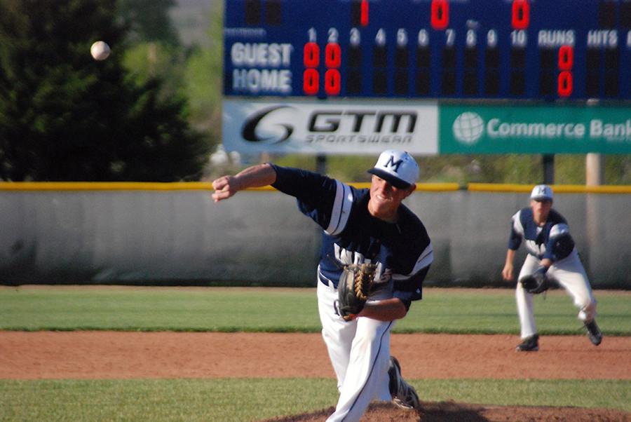 Junior Nick Wohler pitches in the second game of the doubleheader against Topeka West last year. The Indians lost, 3-0.