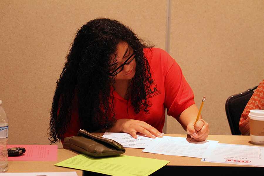 Senior Agneris Andino assists with judging events at FCCLA State. 