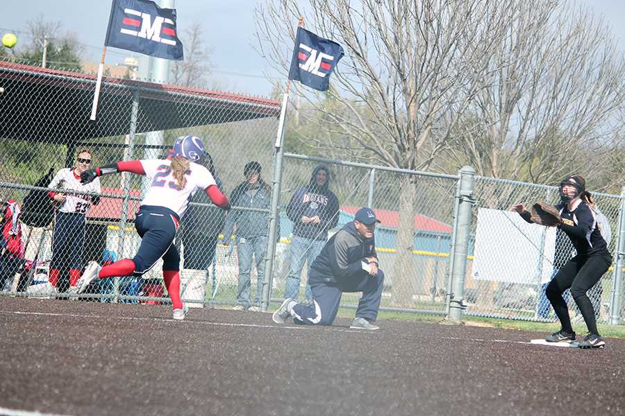 Softball splits with T-High