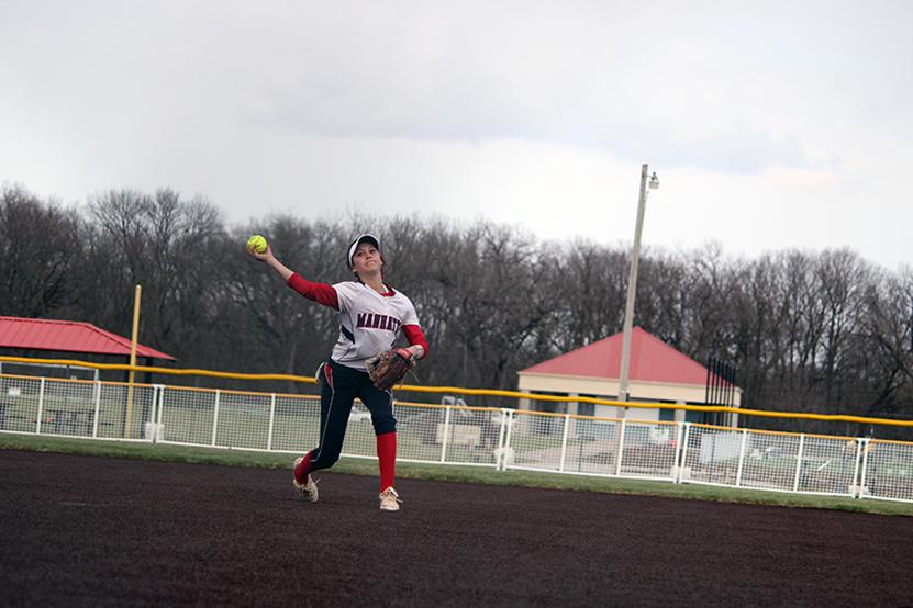 Softball splits with T-High