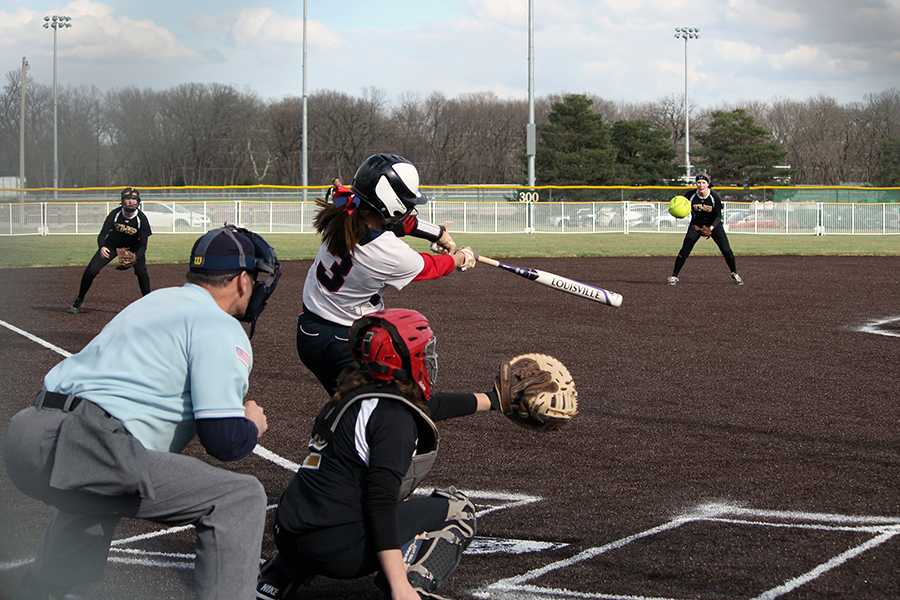 Softball splits with T-High