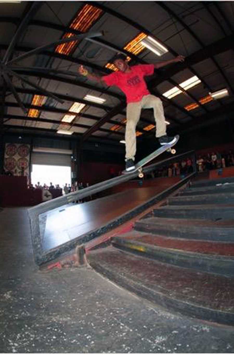 Freshman Kristoffer Clayton skates down a railing.