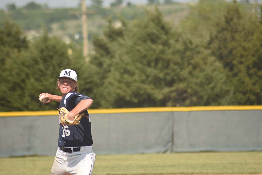 Fastball fury. Senior Nicholas Wohler comes out of his wind up throwing a four seem fastball. Wohler allowed only three runs in seven innings pitched
