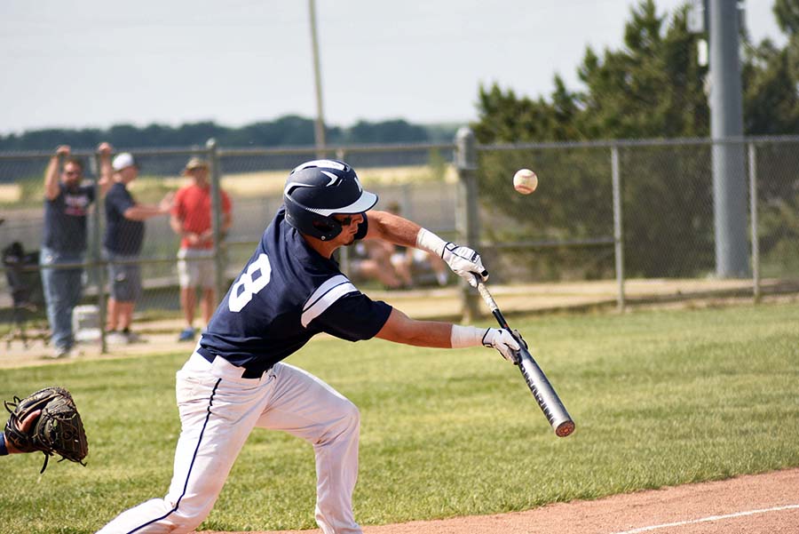 Pursuit of a bunt. Senior Brady Woborny tries to advance the base runners by bunting the ball along the third base line. Woborny went 1-3 at the plate.