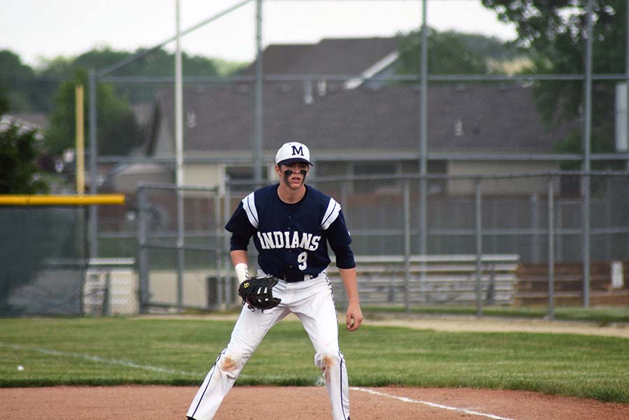 Ready the glove. Junior Carson Marsh watches the pitch as he prepares field the ball against Junction City. Marsh went 1-3 at the plate on the day.