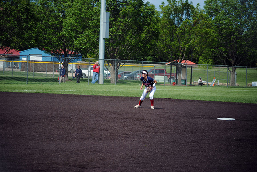 Sophomore Haleigh Harper awaits an incoming groundball. Harper is currently verbally committed to play softball at the University of Kansas.
