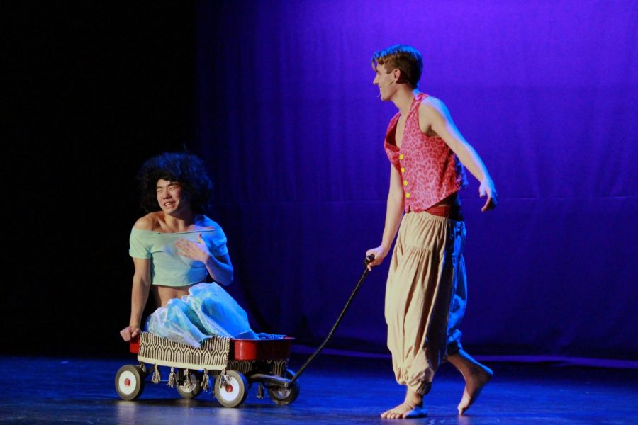 Junior Suman Wang rides on the magic carpet helping senior Will Erickson with his performance of the beloved Disney movie Aladdin. 