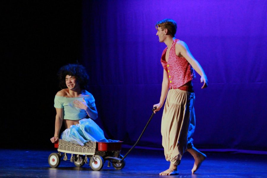 Junior Suman Wang rides on the 'magic carpet' helping senior Will Erickson with his performance of the beloved Disney movie "Aladdin". 