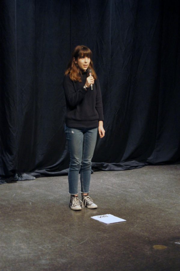 Junior Katharina Ohler recites her poem December 5th at the third annual Poetry Slam. Ohler summited another poem January 27th and went on to win.