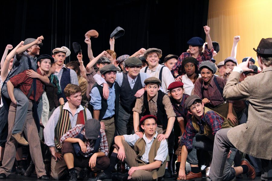 The+cast+of+Newsies+acts+during+a+scene+from+the+Manhattan+High+Schools+fall+musical.+TThe+musical+this+year+is+Newsies+a+musical+about+taking+action+against+raised+newspaper+prices.+The+musicals+first+performance+was+this+past+Sunday%2C+Nov.+4.+
