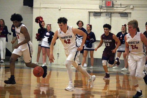 Boys basketball wins overtime thriller