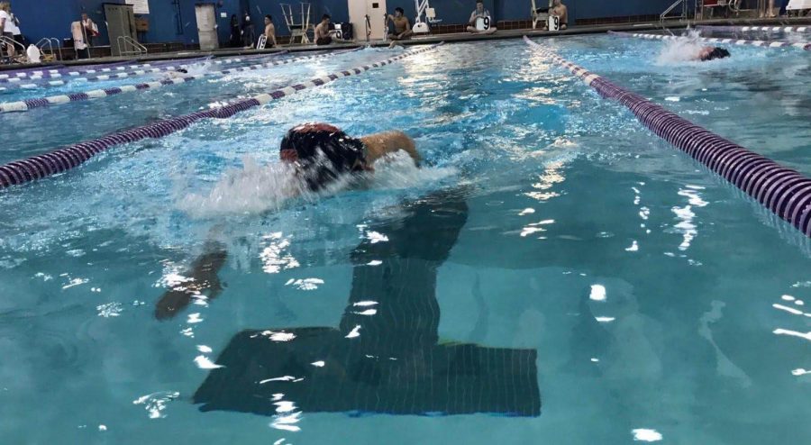 Boys swim team places first despite missing team members