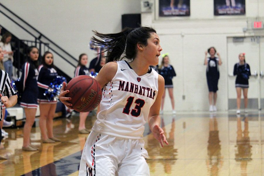 Senior Haleigh Harper runs with the ball during the Lady Indian varsity game against Emporia. The Indians won the game 54-23. 