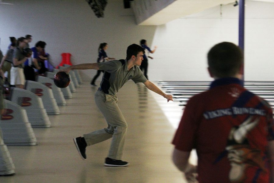 Junior Grant Terill readies to bowl the ball during the Manhattan High School bowling meet on Feb. 5. 