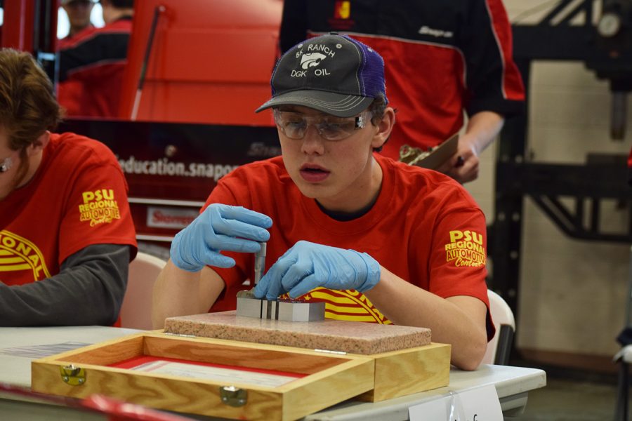 Junior Jacoby Kerr competes in the Skills USA regional automotive competition on Feb. 26. Kerr placed third in the eight stationed competition, with placing third Kerr won a tool box and a $500 scholarship to PSU. 