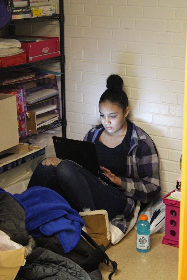 Junior Briyona Wooten works on her poetry on a laptop. 