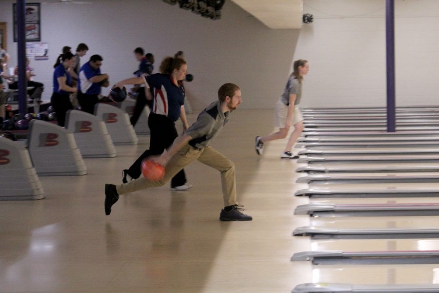 Senior Michael Moran bowls at the bowling meet on Feb. 5 at Little Apple Lanes. 