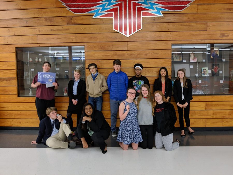 The Forensics team poses with their awards at Shawnee Heights. The team gained five new national qualifications, bringing them to a total of seven.