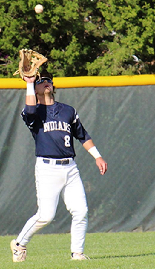 Senior Ben Gallager catches the ball during the MHS Varsity baseball game. The varsity team won both their games fo the day. 