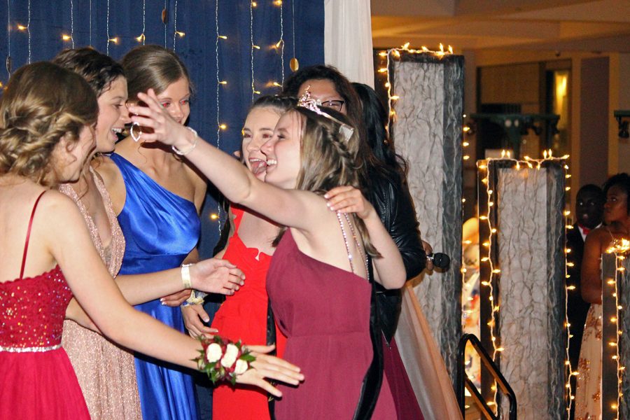 Senior+Cami+Wells+hugs+her+fellow+prom+queen+nominees+after+being+announced+as+the+2019+prom+queen.+Along+with+Wells%2C+senior+Jered+Zhang+was+voted+in+as+prom+king.+