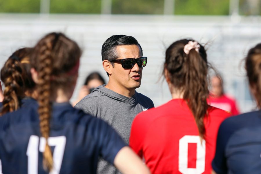 The new boys soccer head coach, Mike Sanchez, advises the girls soccer team -- as girls soccer head coach -- on one of their games in the 2019 girls soccer season. 