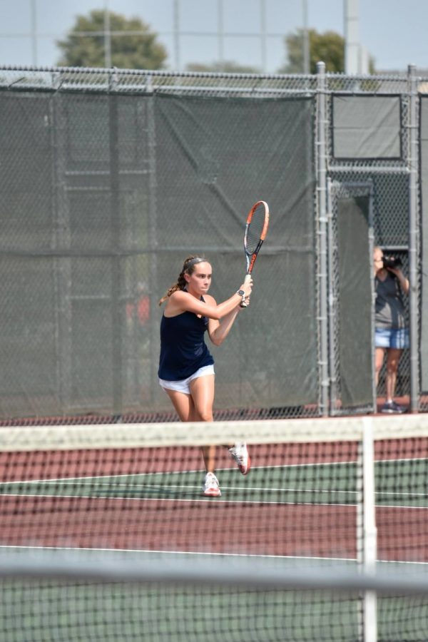 Junior Maura Wiens sends the ball across the court at the Emporia Invitational on Saturday. Photo Courtesy of Gerald Wiens